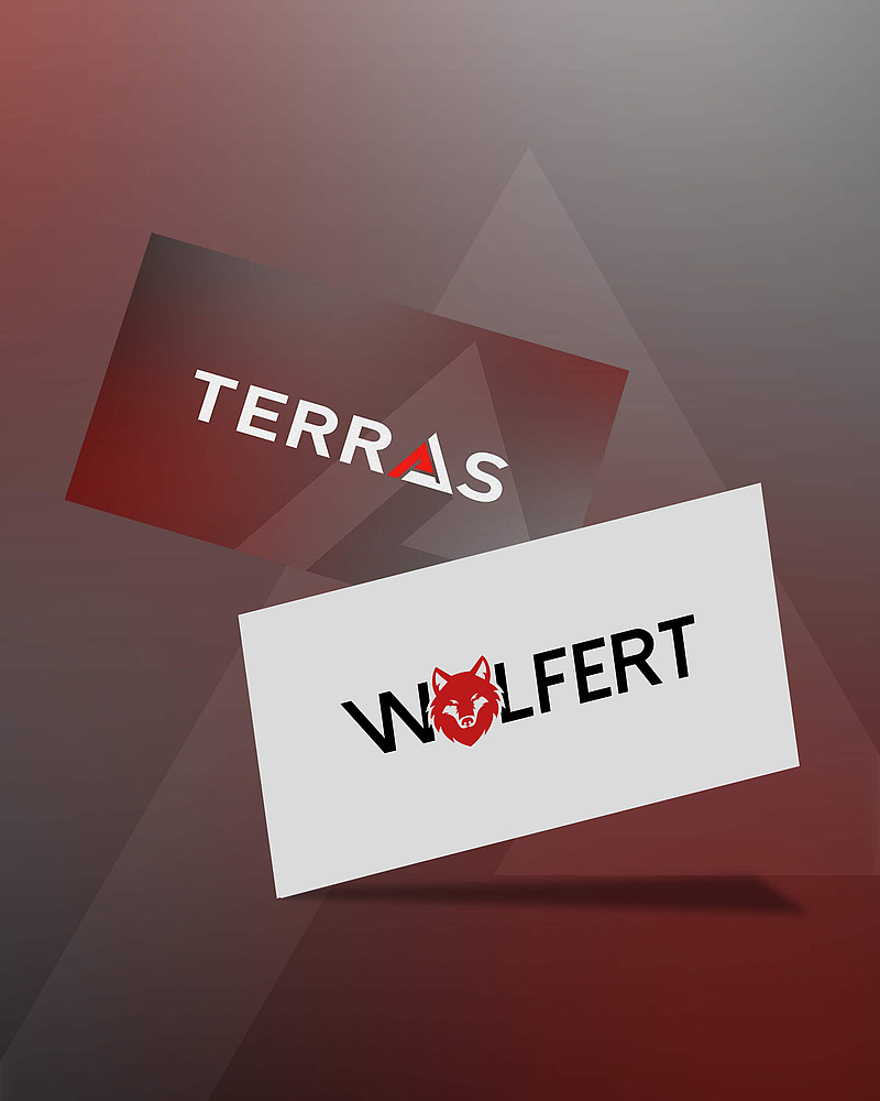 Visitenkarten mit den Logos von TERRAS und Wolfert